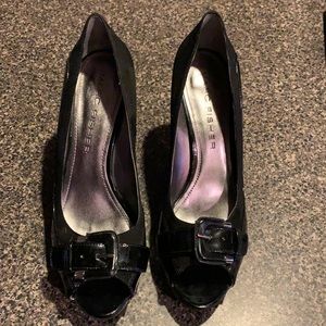 Women’s black high heeled platform shoes